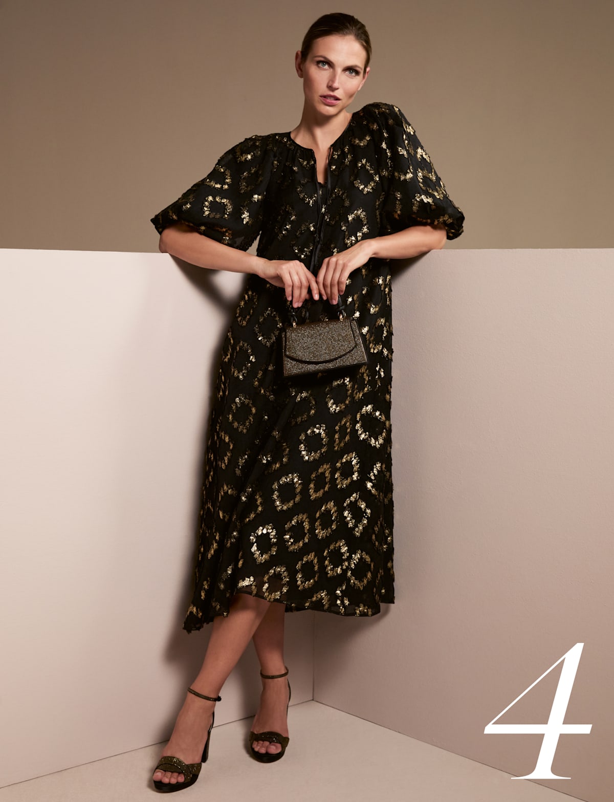  Woman wearing Phase Eight party dress