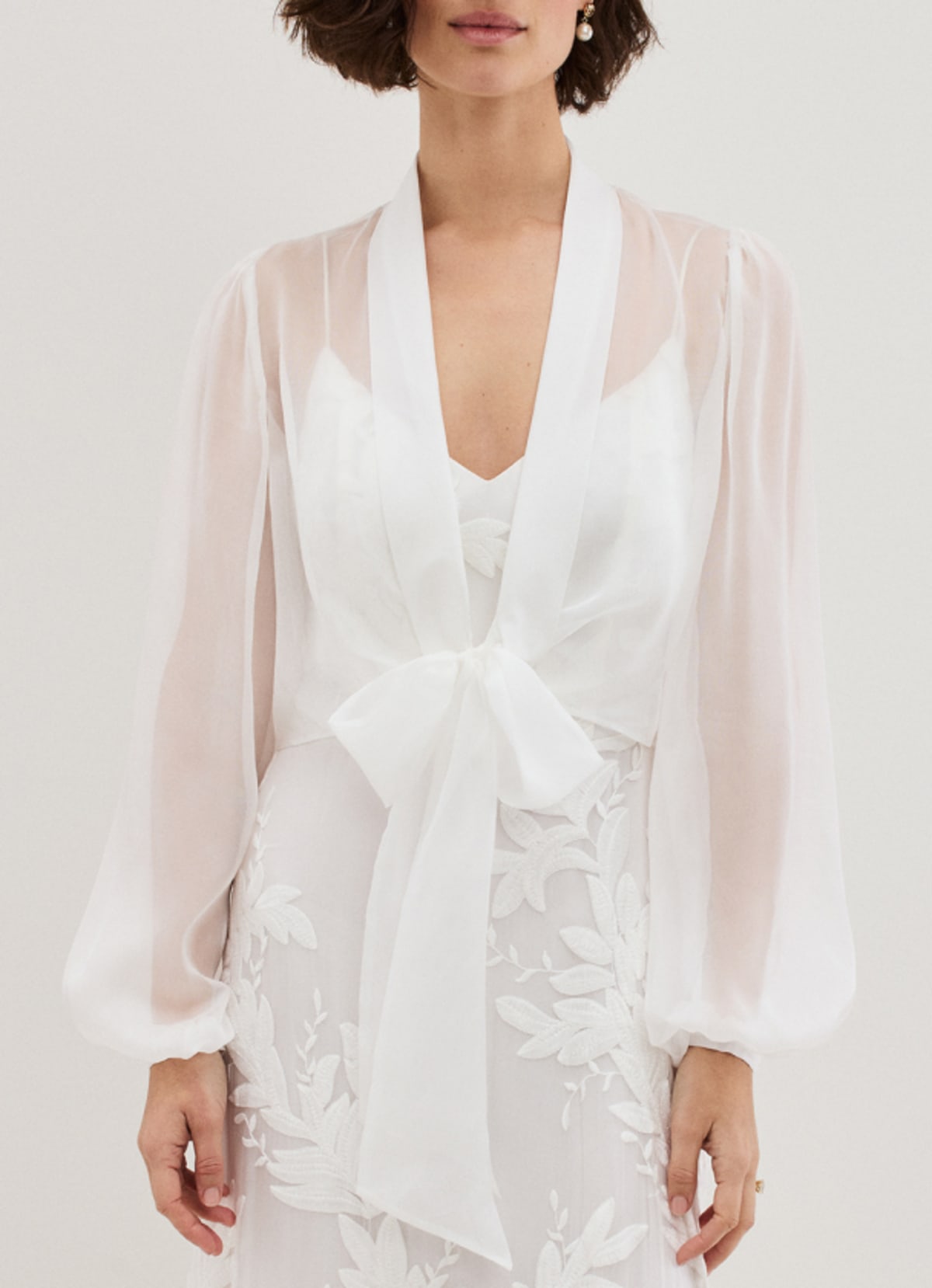 Woman wearing Phase Eight bridal dress
