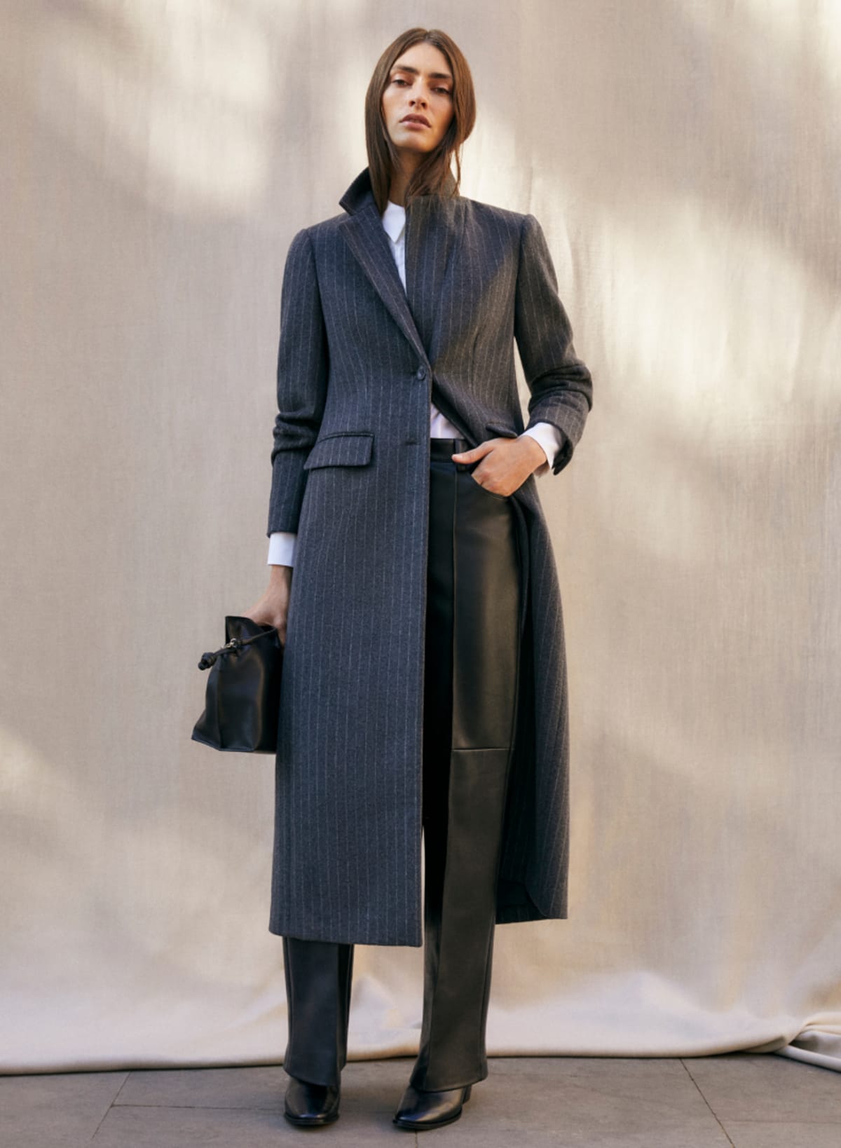 Woman wearing Phase Eight grey coat