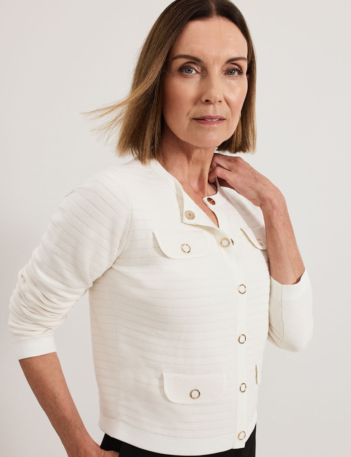 Woman wearing Phase Eight knitwear