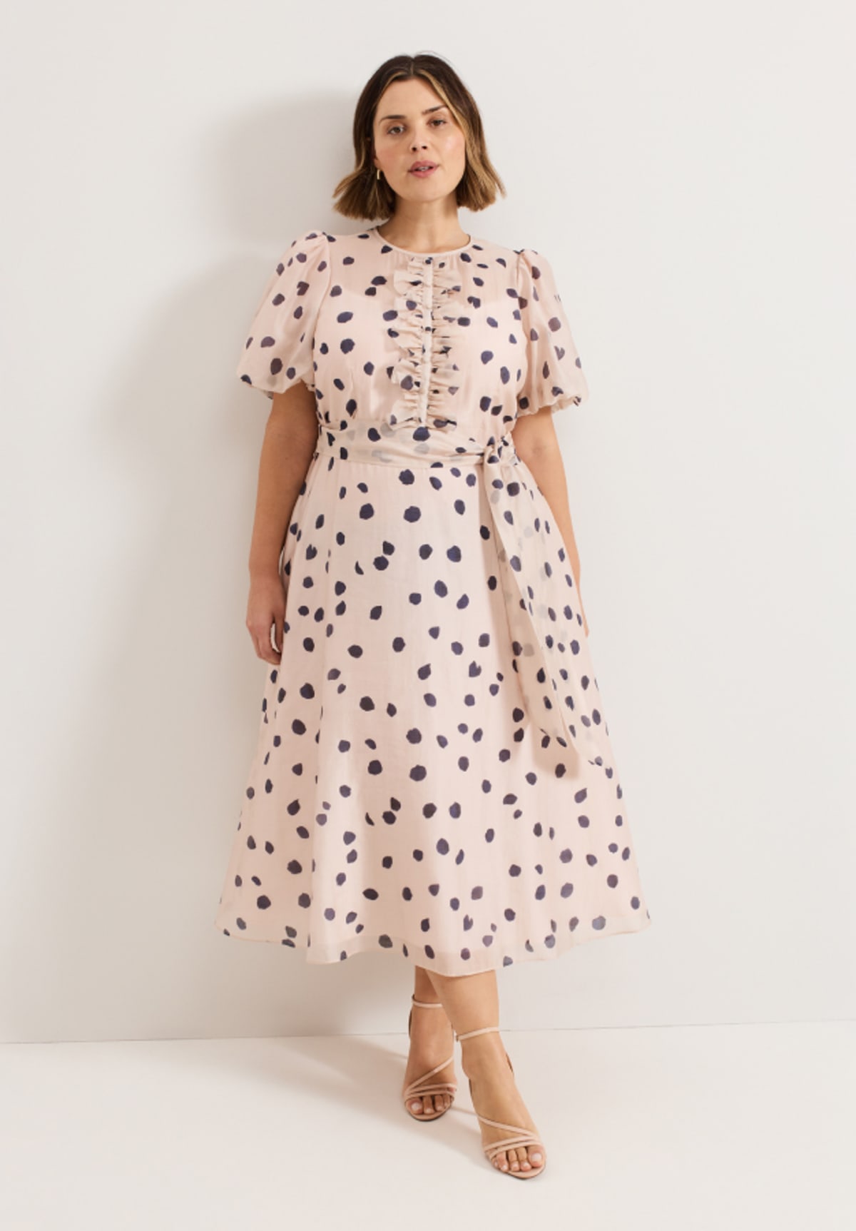 Woman wearing Phase Eight dress