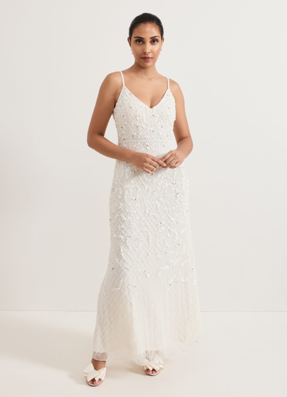 Woman wearing Phase Eight petite bridal style