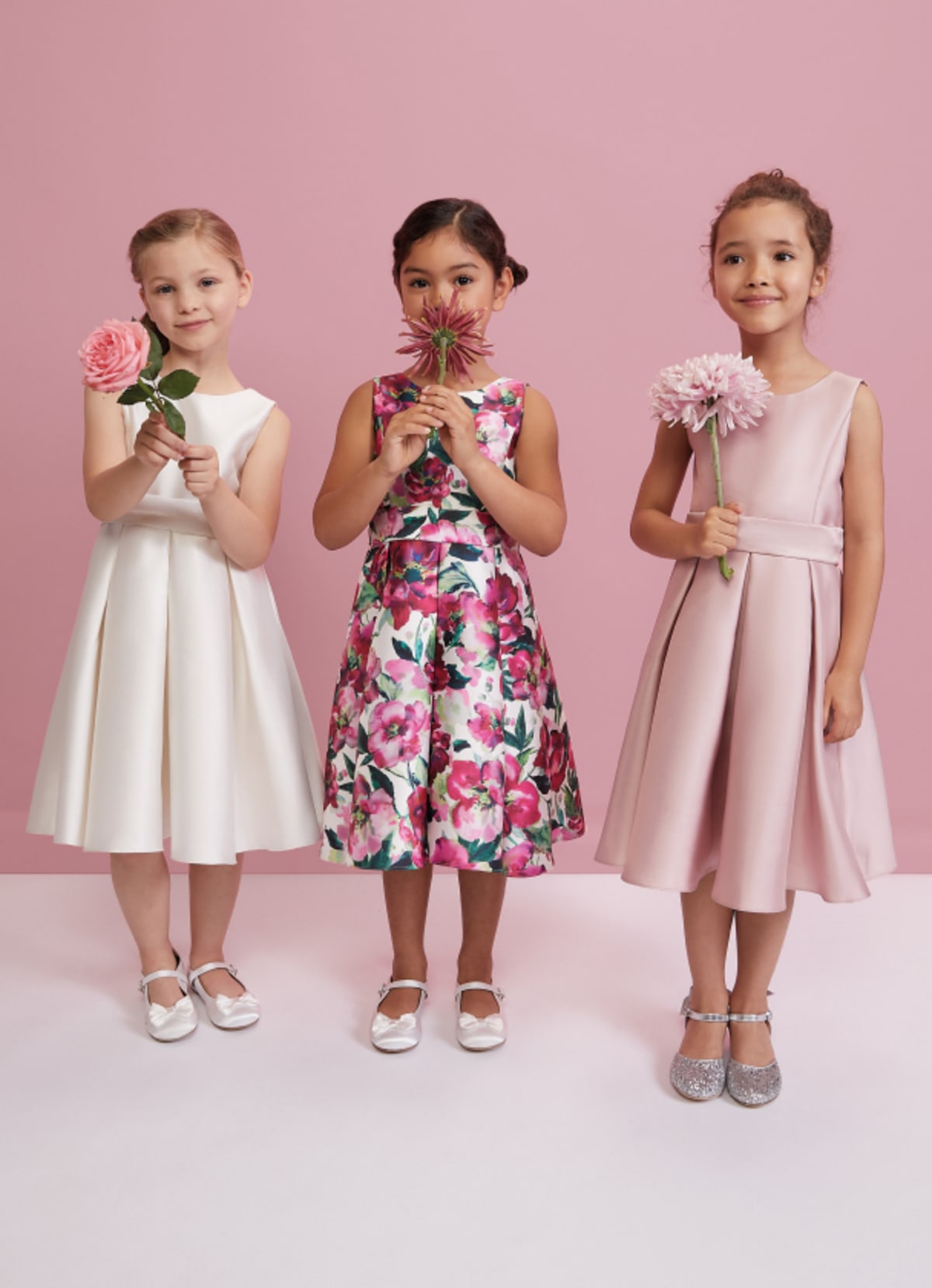 Girls wearing Phase Eight childrenswear dresses