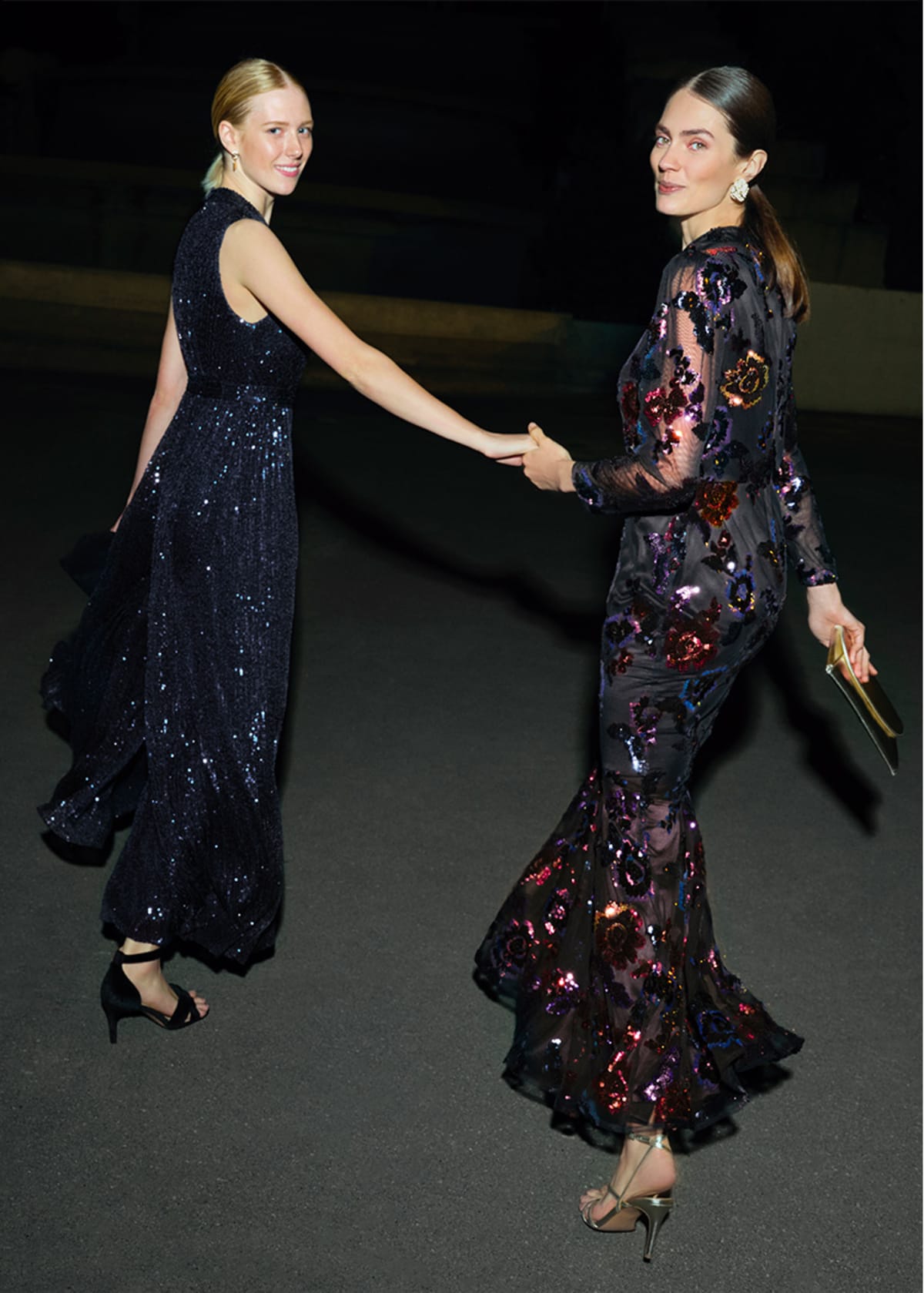 Woman wearing Phase Eight fringe maxi dress