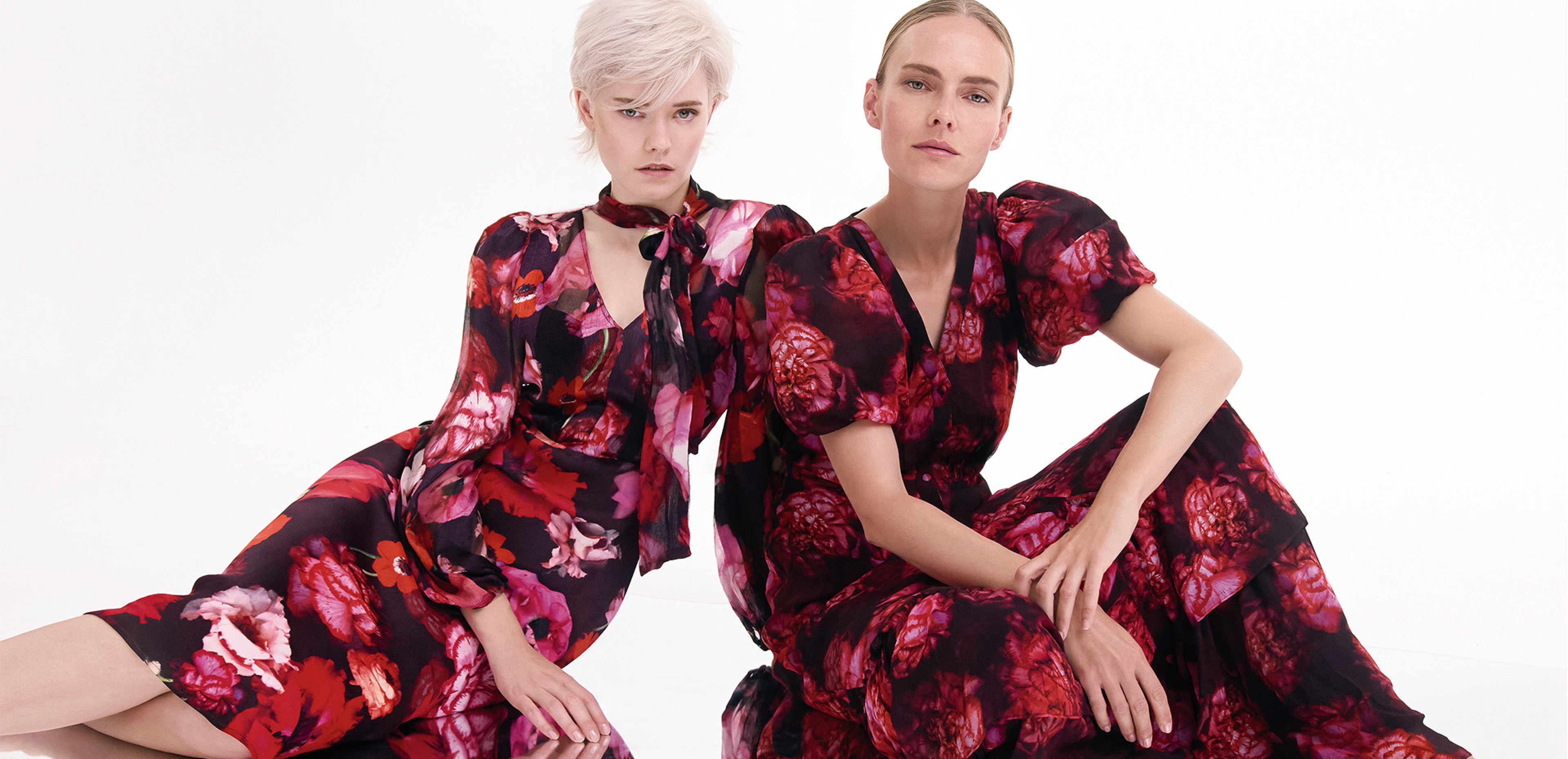 Women wearing Phase Eight event dresses