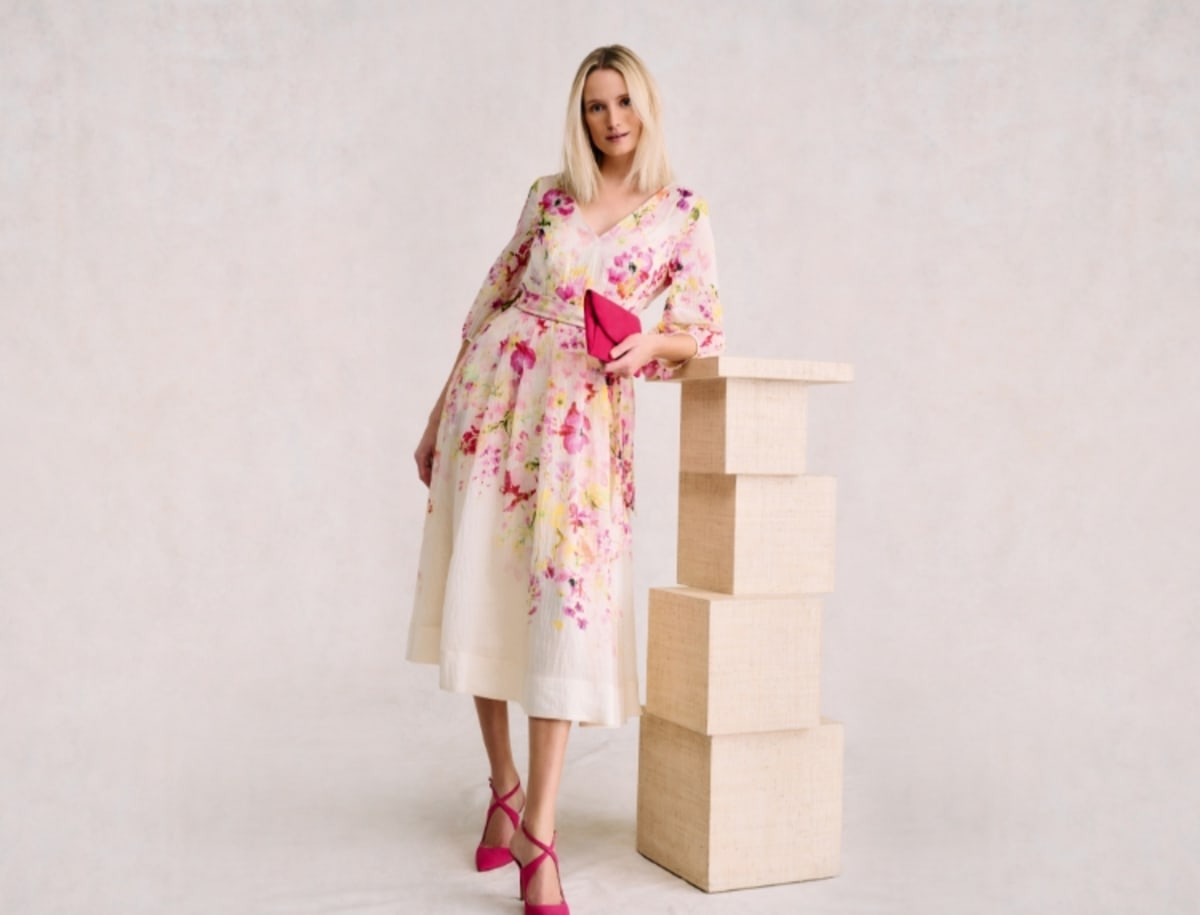 Woman wearing ombre pleated dress